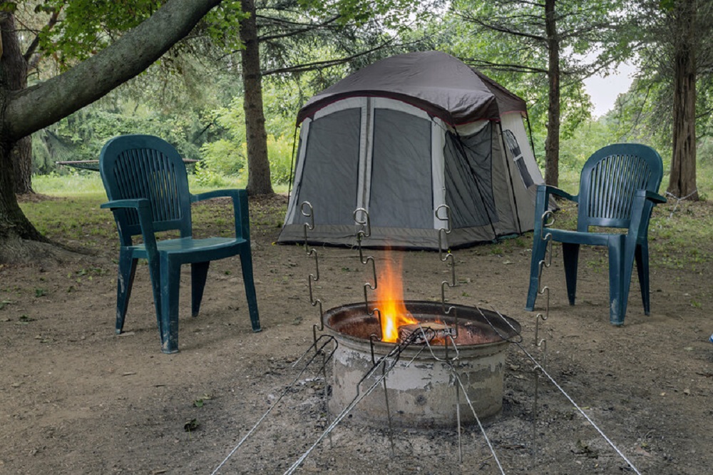 canopy tent and a campfire